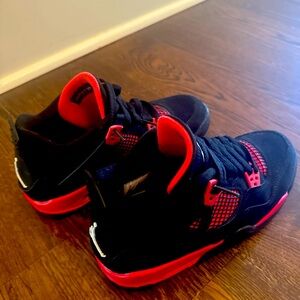 Size 7 youth Nike Jordan 4s Red Thunder